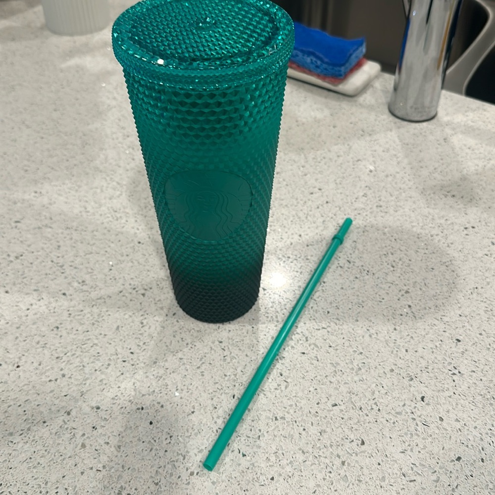 24oz Green studded Starbucks tumbler.